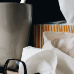 Mug of tea, tissue and, glasses