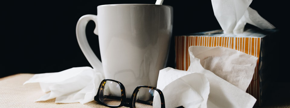 Mug of tea, tissue and, glasses