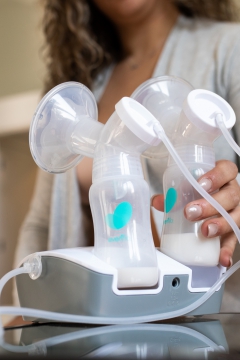 Woman with Evenflow breast pump