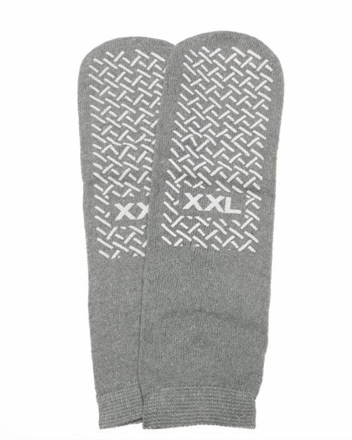Pair of gray Medline single-tread slipper socks in size 2XL showing the white rubberized anti-slip gripper pattern fused to the bottom of the soles for fall prevention. Product Image