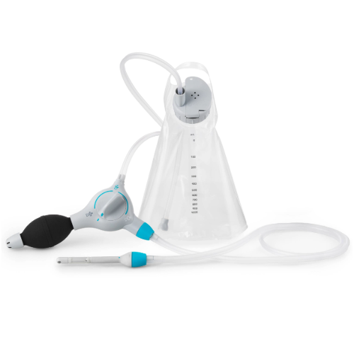 A detailed view of the Peristeen Plus bowel management system showing the ergonomic white control unit with turquoise dial, gray leg straps, and the updated clear water bag. Product Image