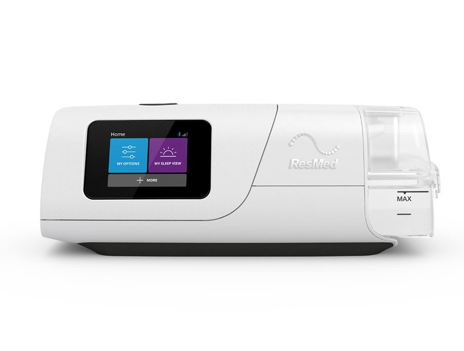 Front view of the white ResMed AirCurve 11 VAuto BiPAP machine featuring its digital touchscreen interface and integrated humidifier tub. Product Image