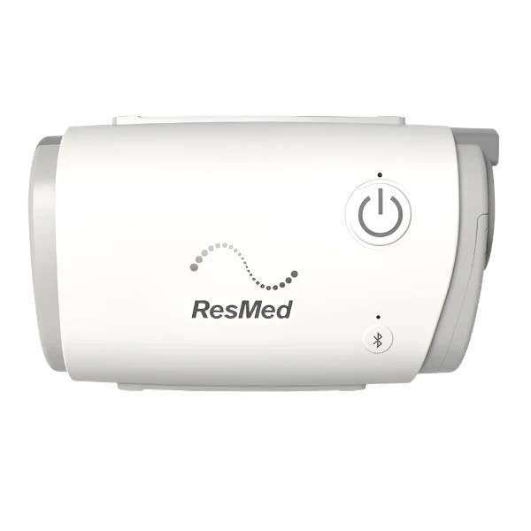 ResMed AirMini AutoSet Top Profile Direct top profile view of the white ResMed AirMini AutoSet travel CPAP machine with power button and status light. Product Image