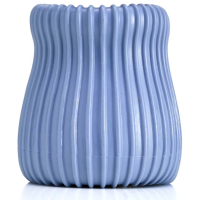 Blue SIGVARIS Doff N’ Donner Rolly device, a soft fluid-filled ring used for applying compression stockings.