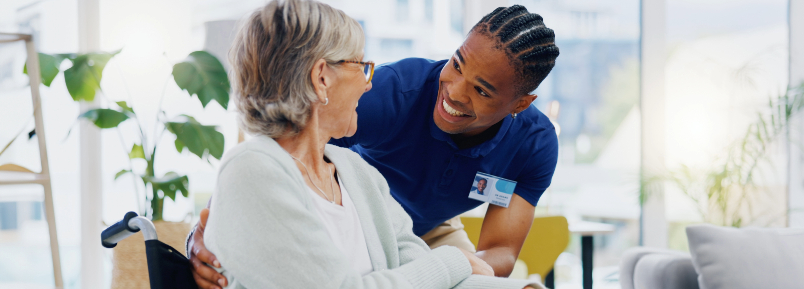 Caregiver checking in with a patient