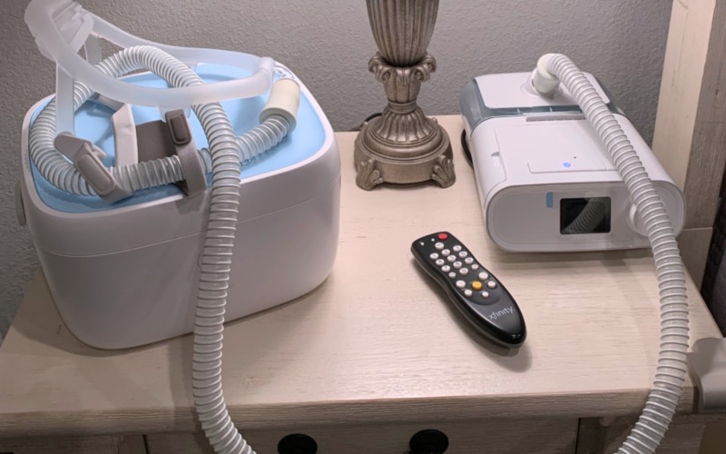 PAPtizer on a nightstand with a CPAP machine