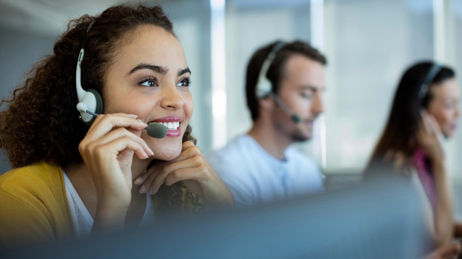 Person wearing a headset in customer support role.